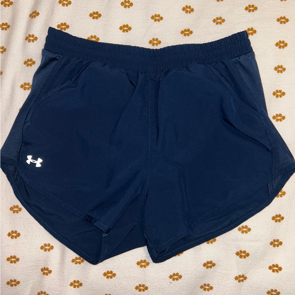 Small, navy blue loose HeatGear Under Armor shorts